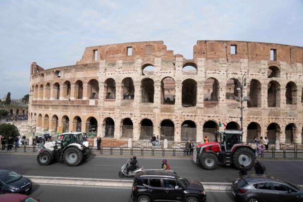 Farmers' tractors run in front of Rome's Colosseum to protest the government and EU agriculture, on Feb. 9, 2024. (Gregorio Borgia /AP Photo)
