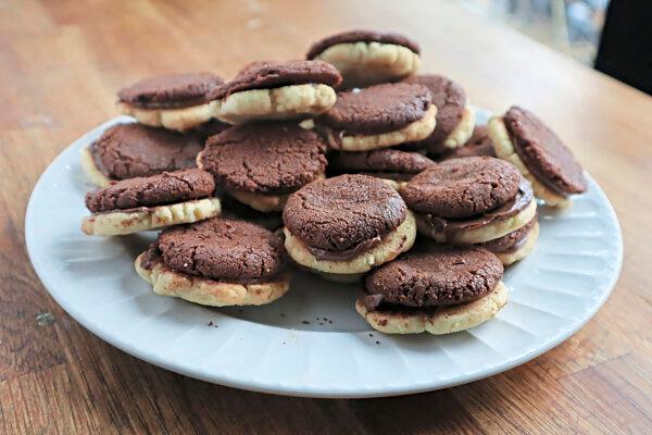 These buttery shortbread cookies are sandwiched with chocolate-hazelnut spread, making them a perfect treat for World Nutella Day on Feb. 5. (Gretchen McKay/Pittsburgh Post-Gazette/TNS)