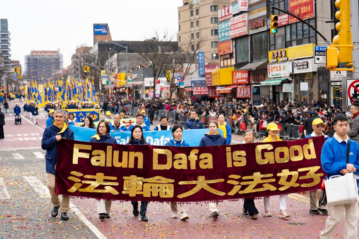 Falun Gong practitioners attend a parade celebrating the Chinese New Year, in the Flushing neighborhood of Queens, N.Y., on Feb. 10, 2024. (Samira Bouaou/The Epoch Times)