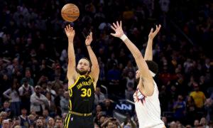 Stephen Curry’s Last Second 3-pointer Lifta Warriors Over Suns 113–112