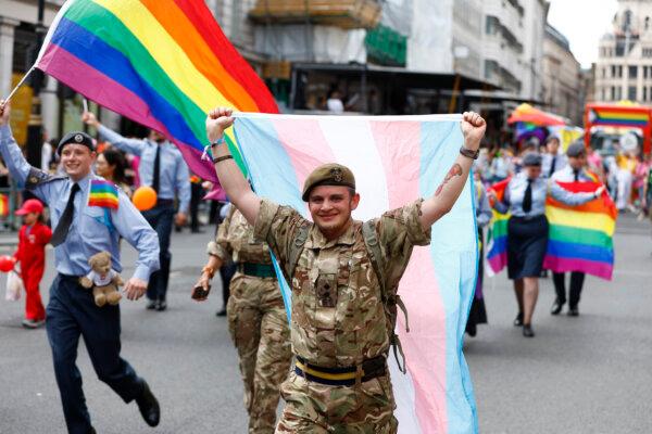 A member of the British Army carries a transgender flag during the Gay Pride Parade in London, England, on July 1, 2023. (Peter Nicholls/Getty Images for Pride In London)