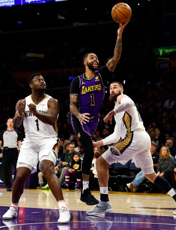D'Angelo Russell (1) of the Los Angeles Lakers takes a shot against Zion Williamson (1) of the New Orleans Pelicans in the first half in Los Angeles on Feb. 9, 2024. (Ronald Martinez/Getty Images)