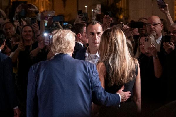 Former First Lady Melania Trump and former President Donald J. Trump attend an event organized by Trumpettes USA at Mar-a-Lago in Palm Beach, Fla., on Feb. 10, 2024. (Madalina Vasiliu/The Epoch Times)