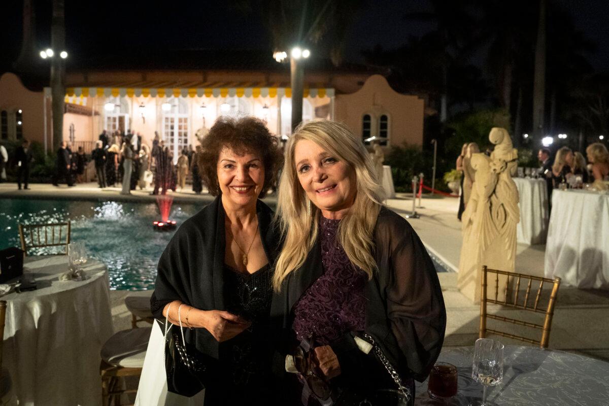 Rachelle Mand (L) and Joanne Wolfe (R), from Palos Verdes, Calif., speak with The Epoch Times during an event organized by Trumpettes USA with former President Donald J. Trump at the Mar-a-Lago Club in Palm Beach, Fla., on Feb. 10, 2024. (Madalina Vasiliu/The Epoch Times)