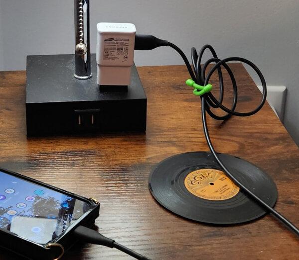 Small tactical ties can help rein in long cords on a hotel nightstand or in other situations. (Myscha Theriault/TNS)