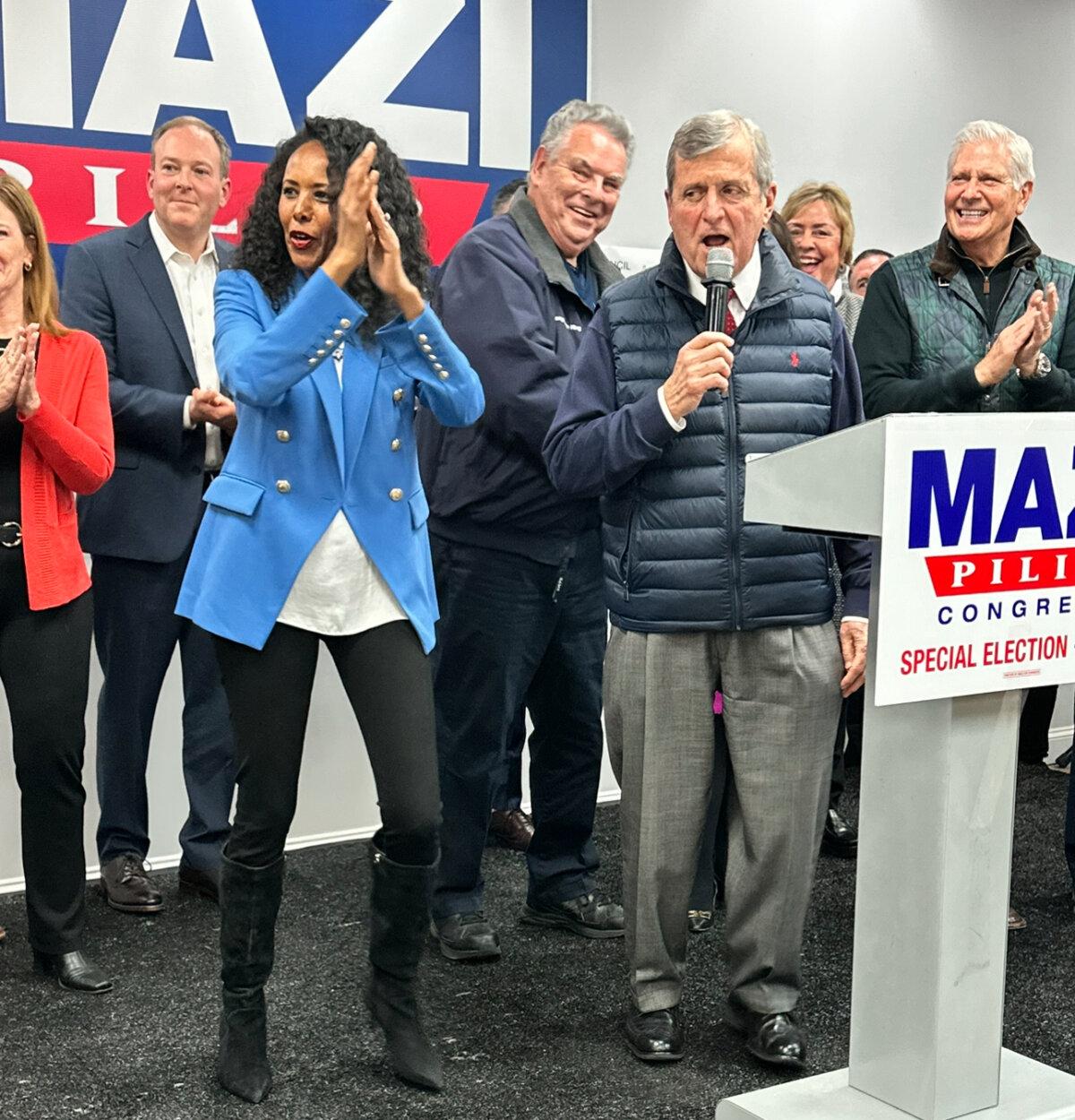 GOP Candidate Mazi Pilip celebrating at a rally in Franklin Square, N.Y., on Feb. 12, 2024, with Nassau County GOP Chair Joe Cairo, Lee Zeldin, former Congressman Peter King, and Nassau County Executive Bruce Blakeman. (Courtesy of Juliette Fairley)