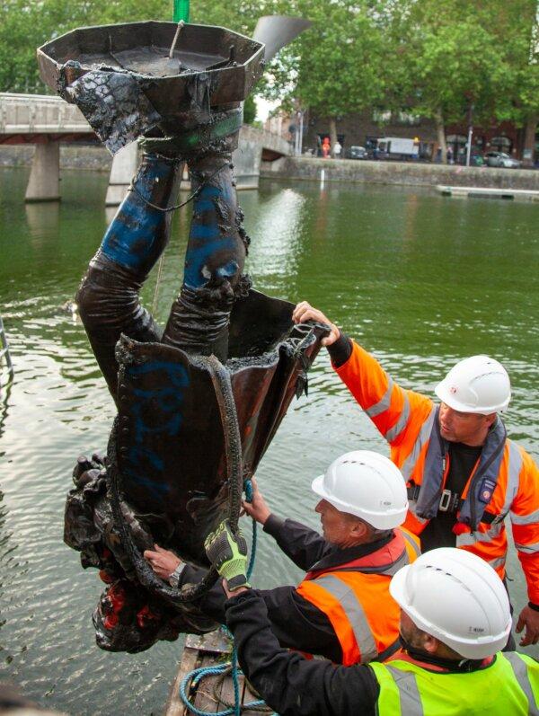 The statue of Edward Colston being removed from Bristol Harbour on June 11, 2020, four days after it was toppled by Black Lives Matter protesters. (Bristol City Council)