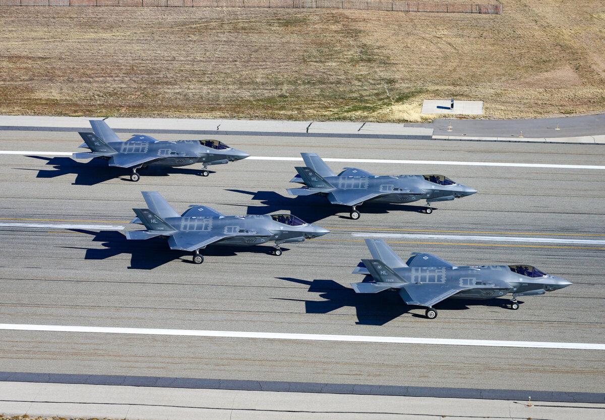 Four F-35A's of Hill Air Force Base's 388th and 419th fighter wings sit on the runway waiting for take-off in Hill Air Force Base, Utah, on Nov. 19, 2018. (George Frey/Getty Images)