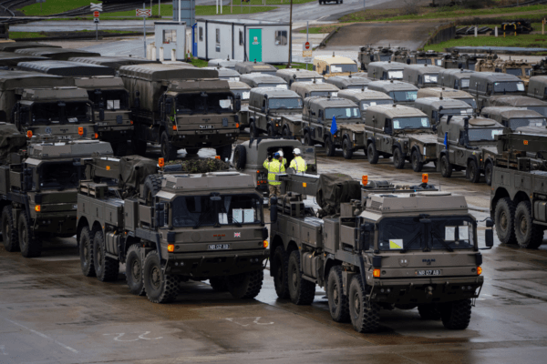 Vehicles and equipment are loaded onboard MV Anvil Point at the Sea Mounting Centre in Marchwood near Southampton, Hampshire, on Feb. 13, 2024. (Ben Birchall/PA)