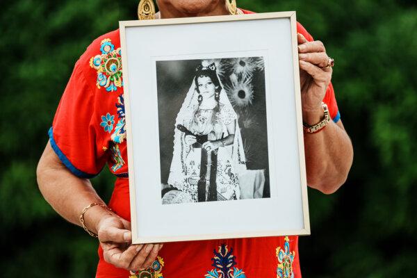 Josefa Vargas Riaño holds a framed photo of herself as queen in 1972. (Marcus Yam/Los Angeles Times/TNS)