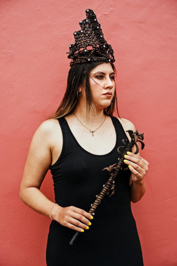 Tania Zayas, 27, poses for a portrait with the vanilla crown and scepter that she won when she was 17. (Marcus Yam/Los Angeles Times/TNS)