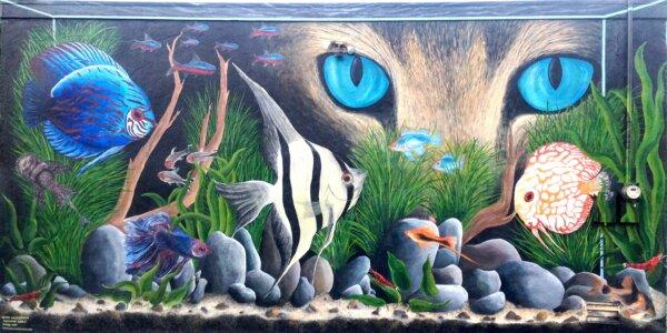 A mural of a cat looking into an aquarium by Suzanne Gayle. (Courtesy of Suzanne Gayle)