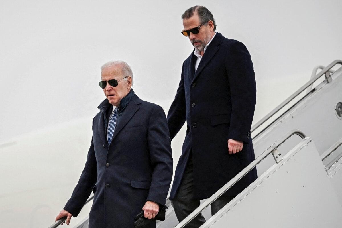 President Joe Biden and his son, Hunter Biden, arrive at Hancock Field Air National Guard Base in Syracuse, N.Y., on Feb. 4, 2023. (Andrew Caballero-Reynolds/AFP via Getty Images)