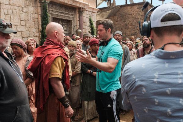 (L to R) Brandon Potter (Quintus) discusses the scene with director Dallas Jenkins in season 4 of "The Chosen." (Courtesy of The Chosen/Mike Kubeisy)