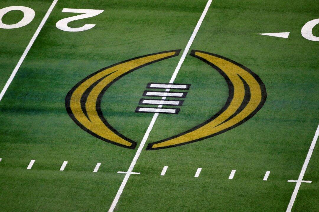 ESPN, College Football Playoff Agree on 6-Year Deal Worth $1.3 Billion Annually, AP Sources Say