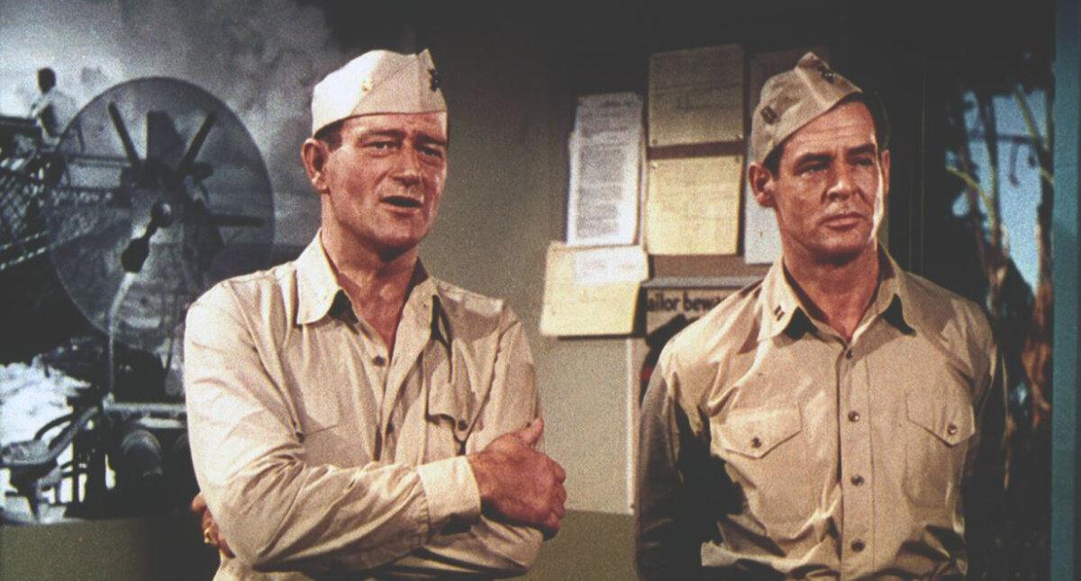 Maj. Dan Kirby (John Wayne, L) and Capt. Carl "Griff" Griffin (Robert Ryan) don’t see eye to eye, in “The Flying Leathernecks.” (RKO Radio Pictures)