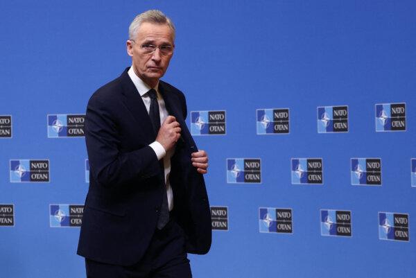 NATO Secretary-General Jens Stoltenberg leaves after a press conference ahead of a NATO defense ministers' meeting at the alliance's headquarters in Brussels, Belgium, on Feb. 14, 2024. (Yves Herman/Reuters)