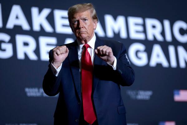 Former President Donald Trump gestures to supporters after speaking at a Get Out The Vote rally at the North Charleston Convention Center in S.C., on Feb. 14, 2024. (Win McNamee/Getty Images)