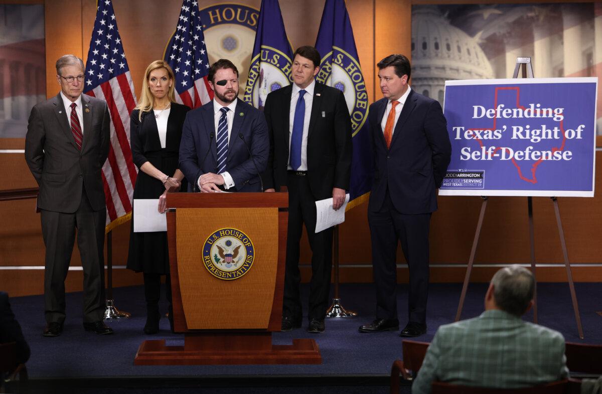Rep. Dan Crenshaw (R-Texas) speaks at a press conference on border security at the Capitol in Washington on Feb. 14, 2024. (Kevin Dietsch/Getty Images)