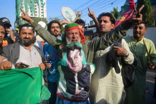 Supporters of Imran Khan's Pakistan Tehreek-e-Insaf (PTI) party protest against alleged rigging in Pakistan's national election results, in Karachi, Pakistan, on Feb. 11, 2024. (Asif Hassan/AFP via Getty Images)