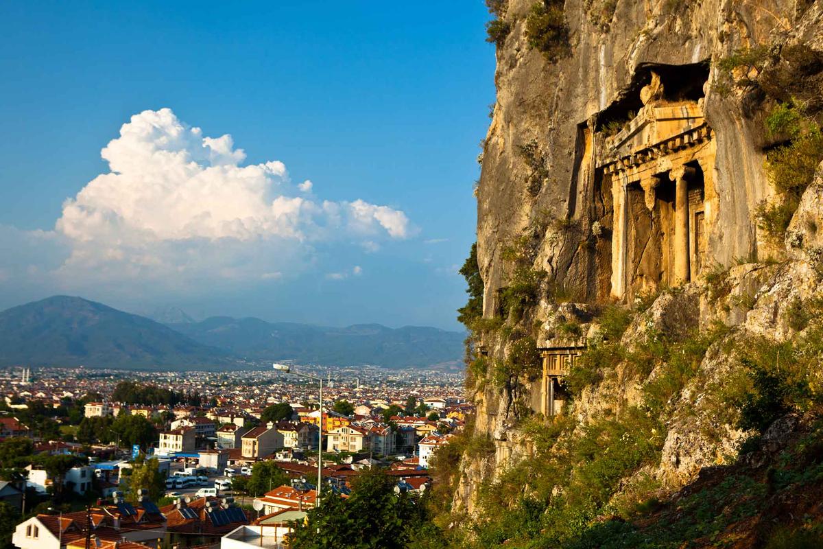 A tomb façade overlooks modern-day Fethiye, Turkey. (Evantravels/Shutterstock)