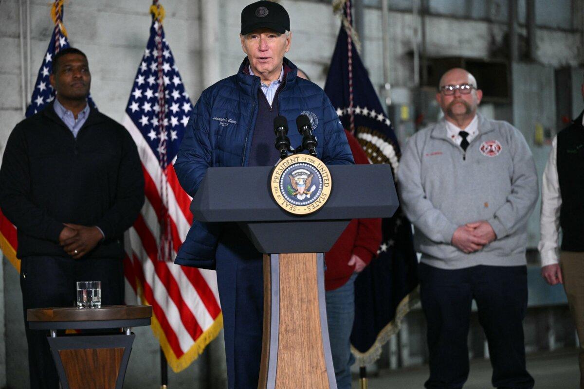 President Joe Biden (C) speaks after receiving an operational briefing from officials on the continuing response and recovery efforts at the site of a train derailment that spilled hazardous chemicals a year ago in East Palestine, Ohio, on Feb. 16, 2024. (Mandel Ngan/AFP via Getty Images)