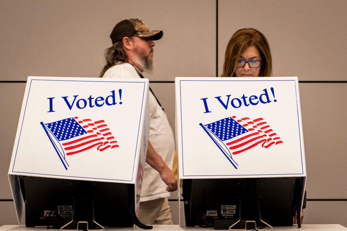 People in an early voting site ahead of the Republican primary election at Wando Mount Pleasant Library in Mount Pleasant, S.C., on Feb. 17, 2024. (Madalina Vasiliu/The Epoch Times)