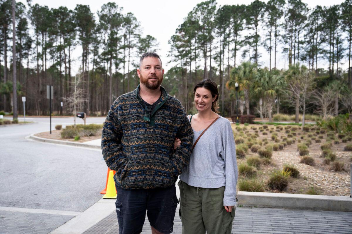 Chris (L) and Katie Mai (R) speak with The Epoch Times after casting their votes at an early voting site ahead of the Republican primary election at Wando Mount Pleasant Library in Mount Pleasant, S.C., on Feb. 17, 2024. (Madalina Vasiliu/The Epoch Times)