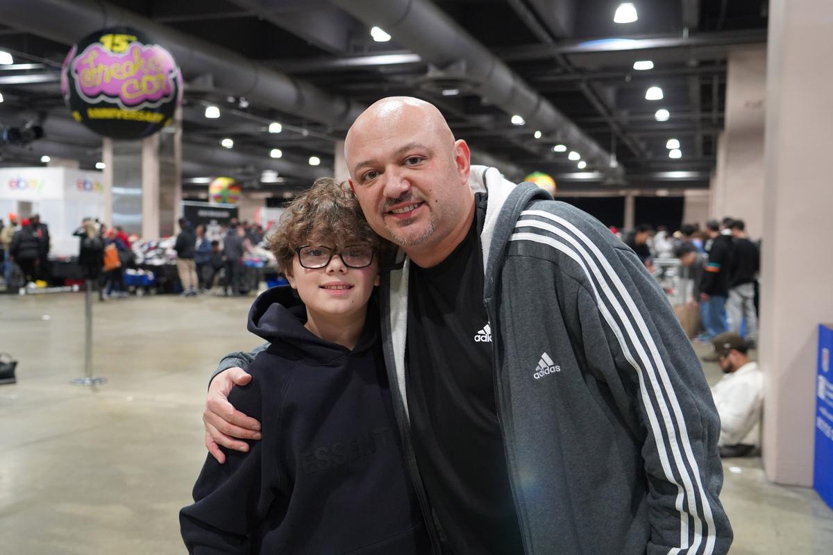Art Mikhelson and his son Daniel Mikhelson at Sneaker Con in Philadelphia, Pa., on Feb. 17, 2024. (William Huang/The Epoch Times)