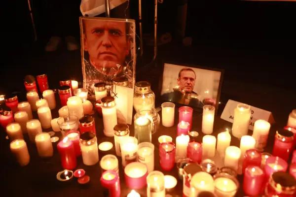 People light candles during a vigil for Alexiei Navalny in front of the Russian Embassy in Munich on Feb. 16, 2024. (Johannes Simon/Getty Images)