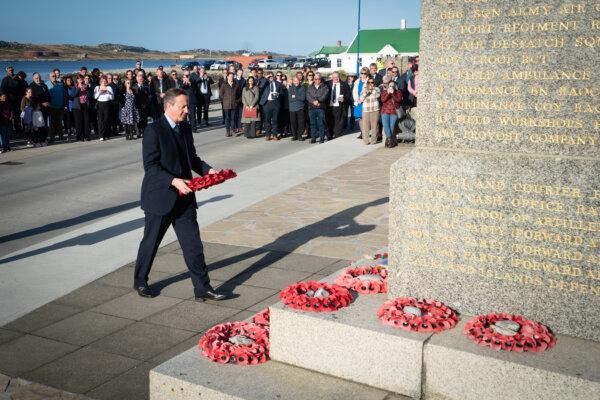 Foreign Secretary Lord David Cameron attends a wreath laying ceremony at the Falklands conflict memorial in Port Stanley on the Falkland Islands on Feb. 19, 2024. (Stefan Rousseau/PA)