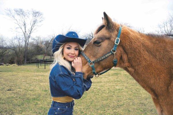 Country Singer RaeLynn Is Not Afraid to Let You Know She Loves Her Country, Family, and Faith Fiercely