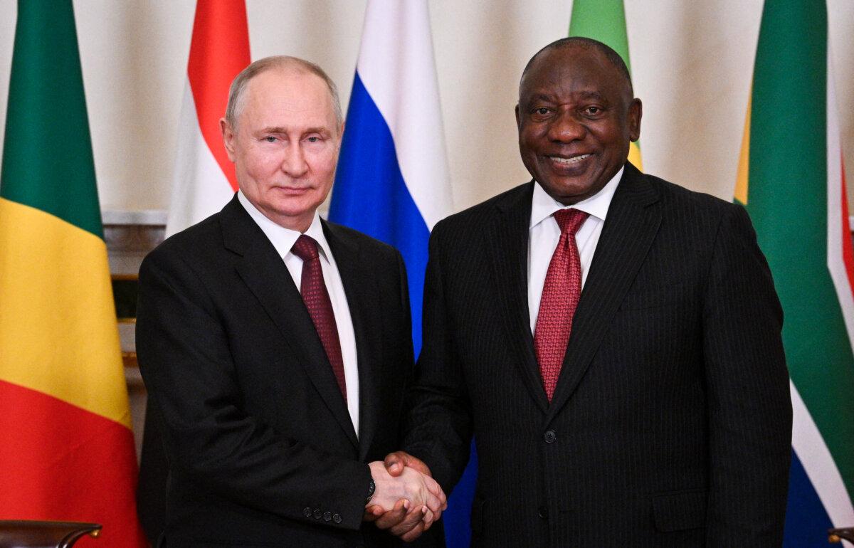 South African President Cyril Ramaphosa (R) meets with Russian President Vladimir Putin ahead of a meeting with African leaders at the Constantine (Konstantinovsky) Palace in Strelna, outside Saint Petersburg, on June 19, 2023. (Ramil Sitdikov/Ria Novosti/AFP via Getty Images)