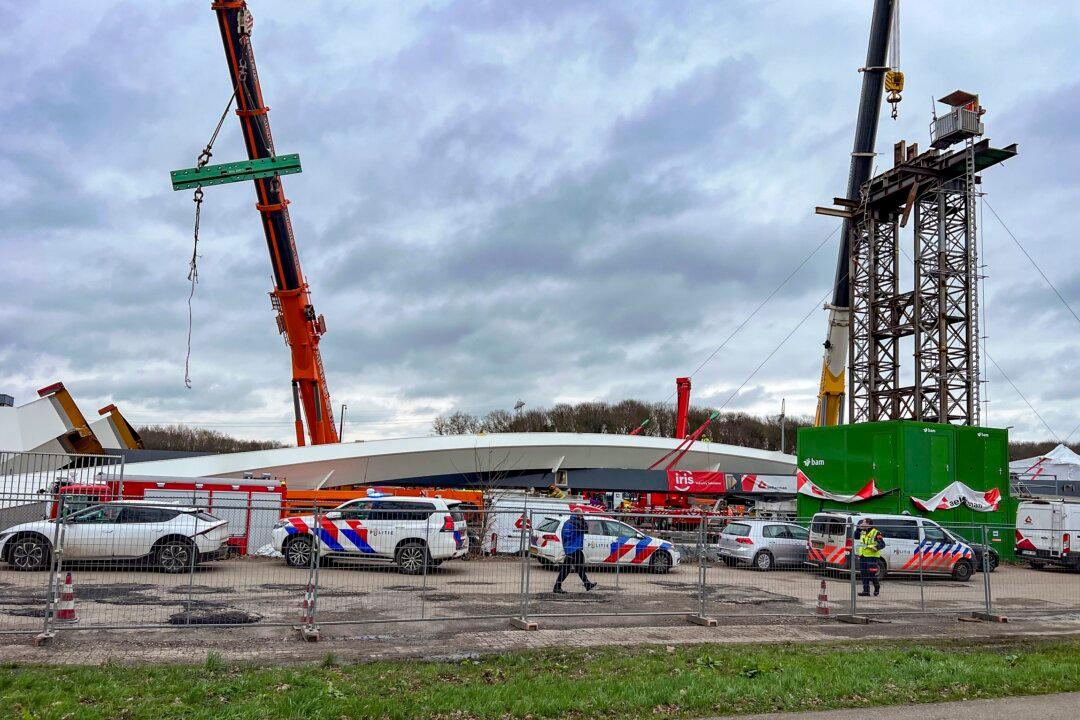 2 Workers Die After Part of Bridge Being Built Over Dutch Canal Collapses