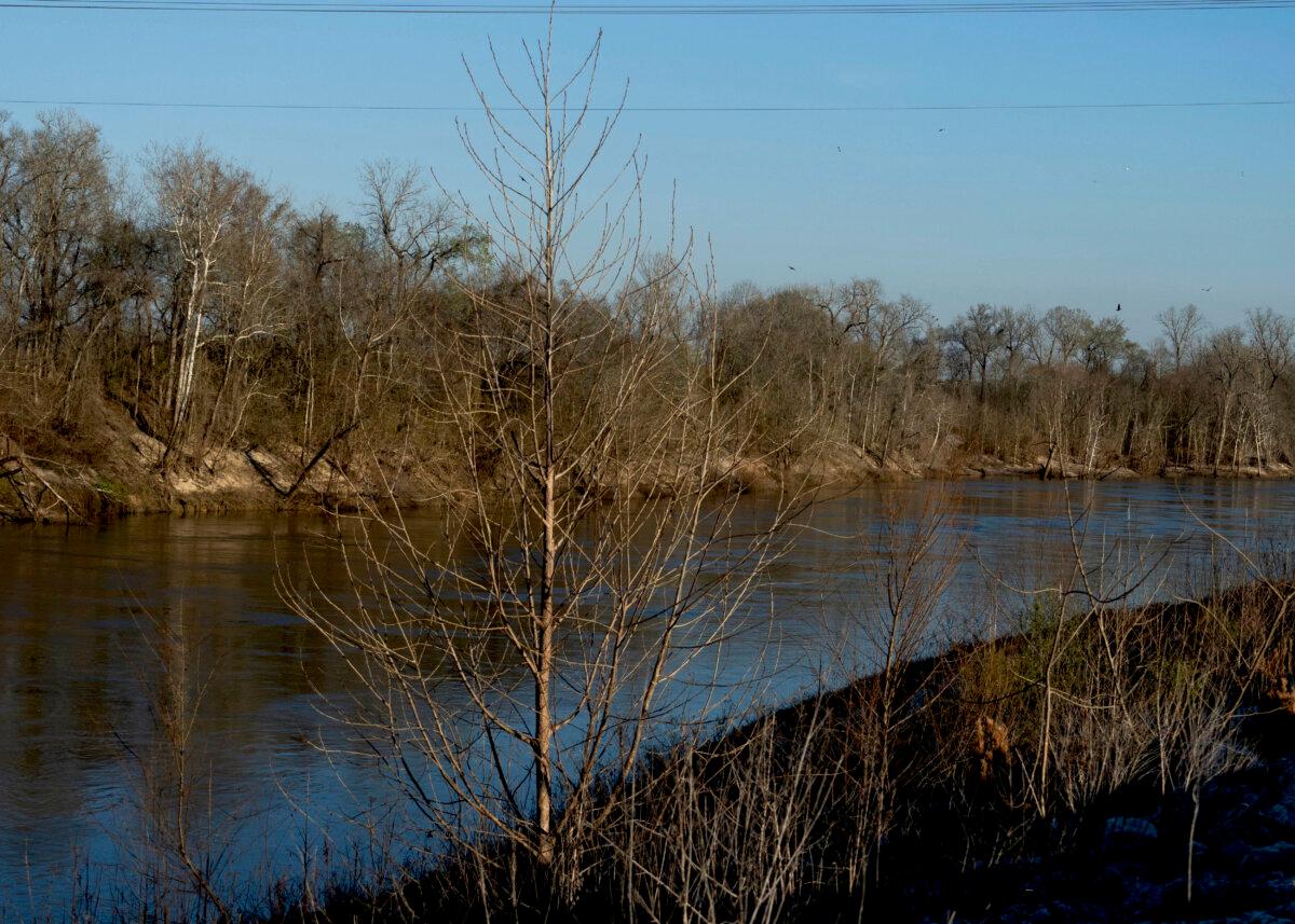 The Trinity River near where law enforcement found the body of 11-year-old Audrii Cunningham, in Livingston, Texas, on Feb. 20, 2024. (Jason Fochtman/Houston Chronicle via AP)