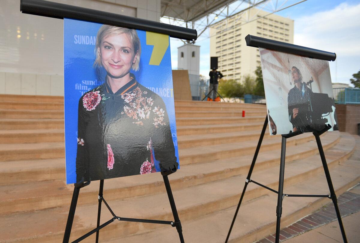 Photos of cinematographer Halyna Hutchins are displayed before a vigil held to honor her at Albuquerque Civic Plaza in Albuquerque, N.M., on Oct. 23, 2021. (Sam Wasson/Getty Images)