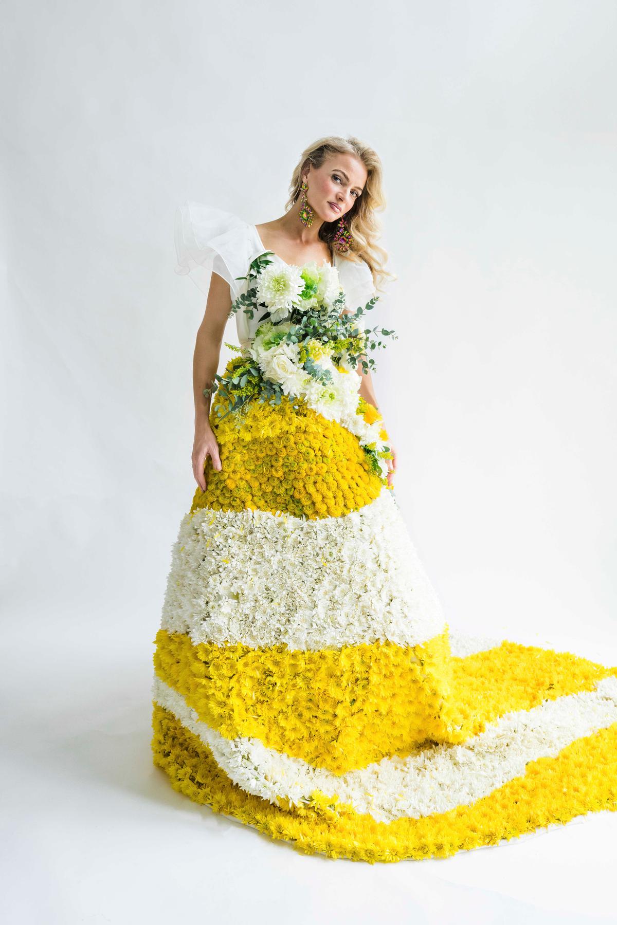 Mrs. Perry wearing the floral dress that she made with her father's funeral flowers. (Courtesy of <a href="https://www.christymarshallphotography.com/">Christy Marshall</a>)