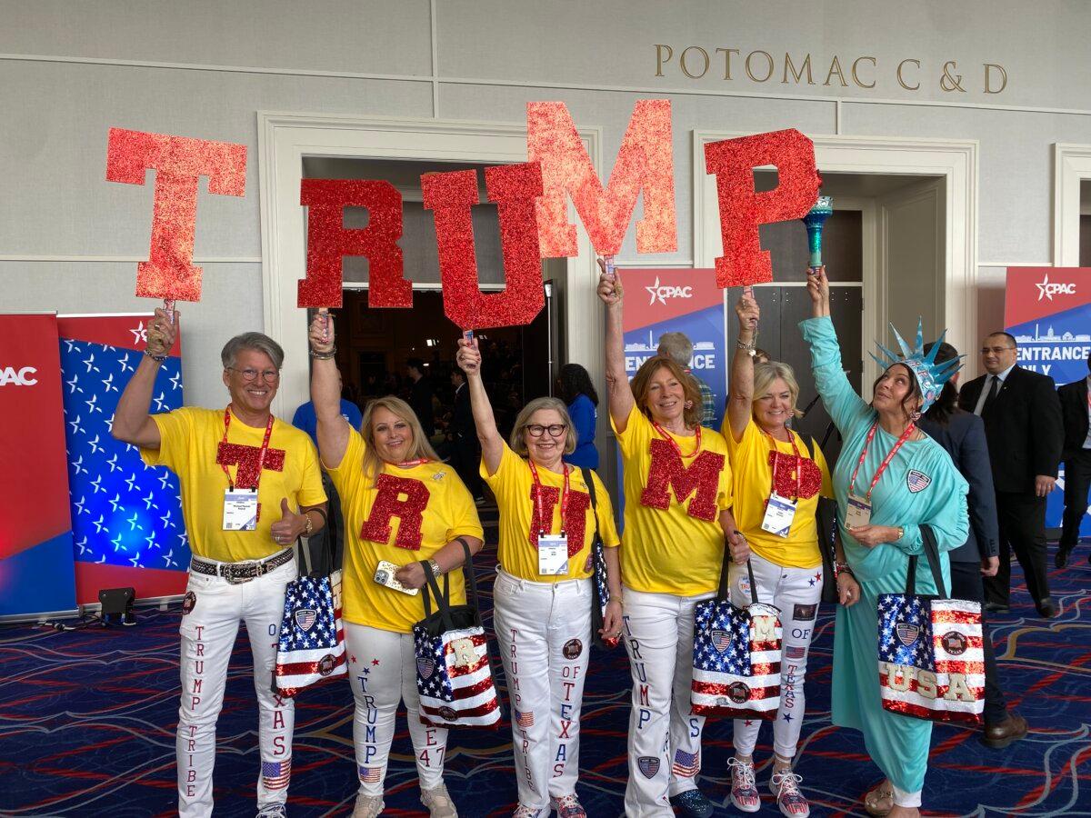 Lisa Wolf (L-3) with her friends showing support for former President Donald Trump during the first full day of CPAC in Washington on Feb. 22, 2024. (Joseph Lord/The Epoch Times)