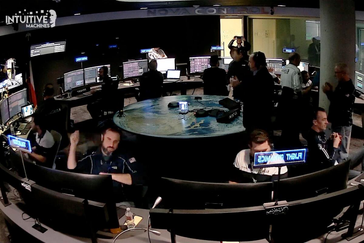 Flight controllers at Intuitive Machines in Houston react after its private spacecraft touched down on the moon on Feb. 22, 2024. (Intuitive Machines via AP)
