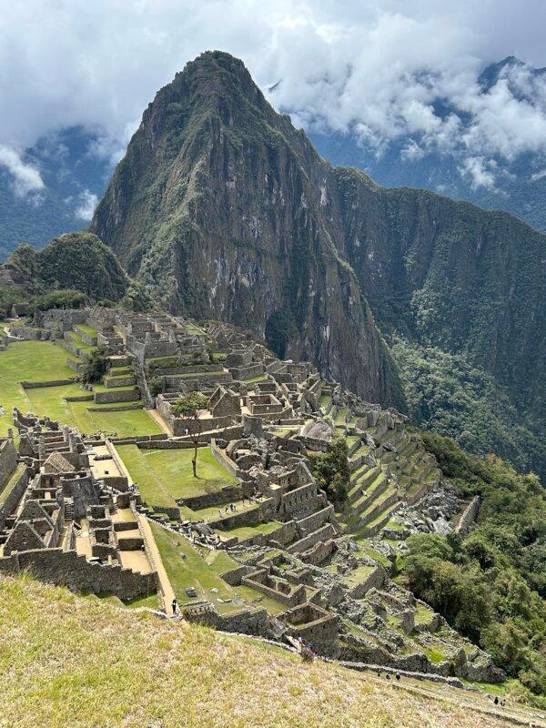 The majestic Huayna Picchu towers over the ancient ruins of Machu Picchu in the high jungle of Peru. (Colleen Thomas/TNS)