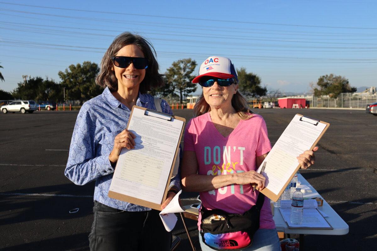 Local residents attend a Prop. 47 reform signature collection drive-thru event hosted by KFI radio at the Honda Center in Anaheim, Calif., on Feb. 22, 2024. (Mei He/The Epoch Times)