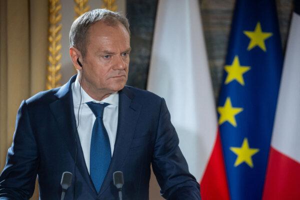 Polish Prime Minister Donald Tusk attends a joint statement to the media with French President Emmanuel Macron (not pictured) as part of their meeting at Elysee Palace, Paris, France, Feb. 12, 2024. (Christophe Petit Tesson/Pool via Reuters)