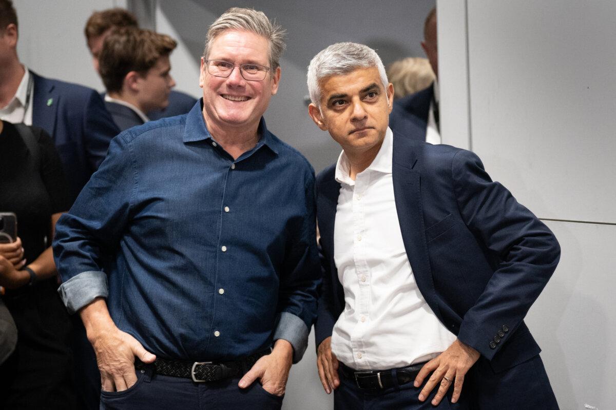 Labour Party Party leader Sir Keir Starmer (L) and Mayor of London Sadiq Khan attend the London Region Reception on the eve of the Labour Party annual conference in Liverpool on Oct. 7, 2023. (Stefan Rousseau/PA Wire)