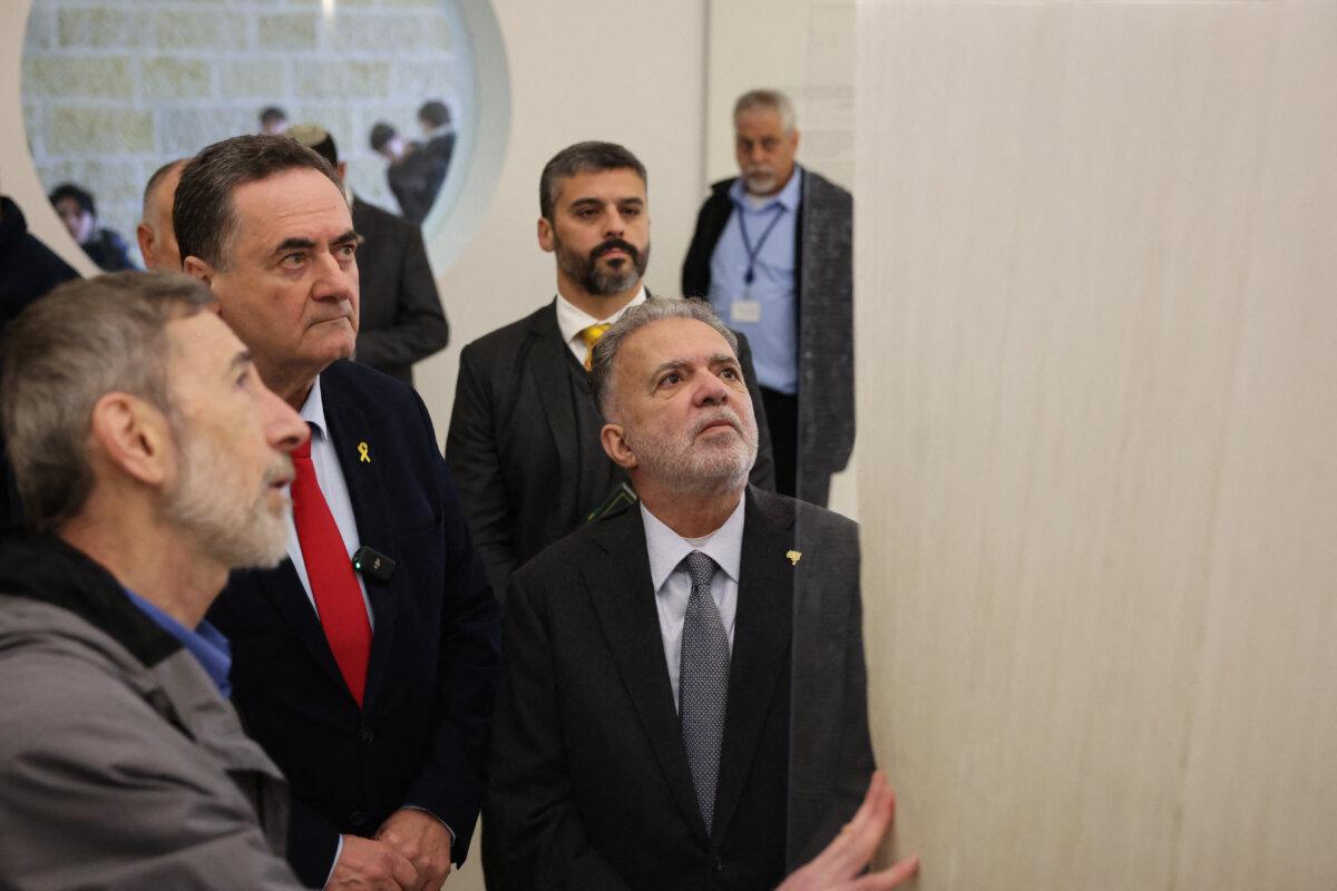 Brazil's Ambassador to Israel Frederico Meyer (C) visits the Yad Vashem Holocaust Memorial museum in Jerusalem on Feb. 19, 2024. (Ahmad Gharabli/AFP via Getty Images)