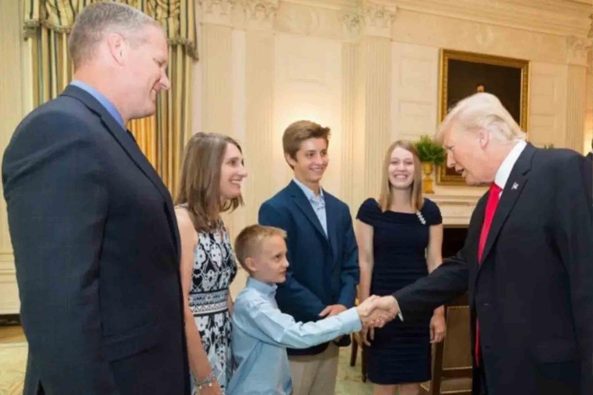 Mr. Finn (far left) and students of Chestnut Mountain meet then-President Donald Trump at the White House. (Courtesy of <a href="https://cmrwv.org/">Steve Finn</a>)