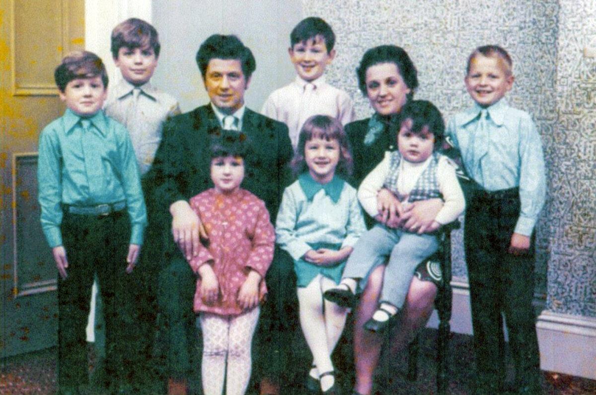 Undated image of John Toland, with his wife Marie, and their seven children, including Danny (second from left). Mr. Toland was murdered on Nov. 14, 1976 by the UDA in Greysteel, Northern Ireland. (Toland family/PA)