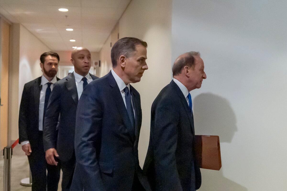 Hunter Biden, left, son of President Joe Biden, arrives with attorney Abbe Lowell at the O'Neill House Office Building for a closed-door deposition on Capitol Hill, in Washington, on Feb. 28, 2024.  (Alex Brandon/AP Photo)