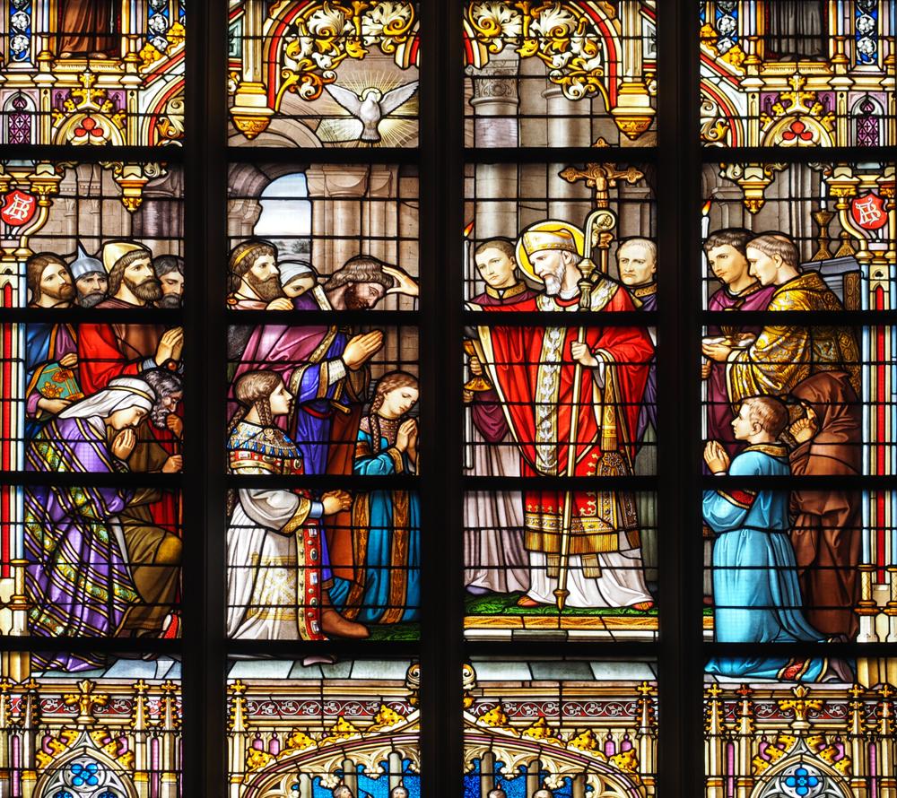 The cathedral holds medieval sculptures, and stained-glass windows depict biblical scenes or events from the early Christian church. This stained-glass window, depicting St. Lambertus blessing a group of converts, was made in 1889 by L.C. Hezenmans and J.B. Capronnier. (Place-to-be/Shutterstock)