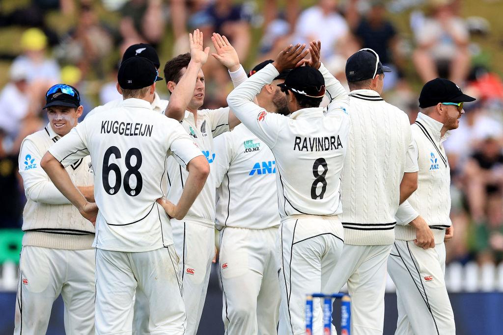 New Zealand players celebrate after Australia's Usman Khawaja was caught during day one of the 1st international cricket Test match between New Zealand and Australia at the Basin Reserve in Wellington, New Zealand on Feb. 29, 2024. (Marty Melville/AFP via Getty Images)