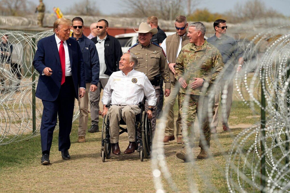 Former President Donald Trump talks with Texas Gov. Greg Abbott during a visit to the U.S.–Mexico border on Feb. 29, 2024, in Eagle Pass, Texas. (Eric Gay/AP Photo)